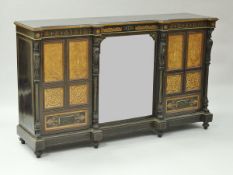 A late Victorian breakfront side cabinet in the aesthetic manner of Collinson and Locke,