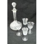 A collection of various acid etched and other liqueur glasses