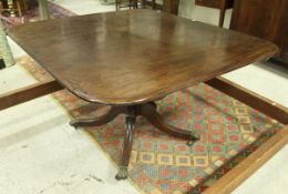 A Victorian mahogany drop leaf snap top breakfast table on quadraped base,