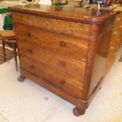 An early 19th Century Scottish figured mahogany chest of four long drawers on lions paw feet bears