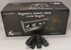 A magnetic Knockdown Duck Target game by Anglo Arms and a set of four folding knives