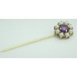 A 9ct gold amethyst and pearl flower head design stick pin