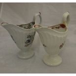 Two 18th Century Newhall porcelain cream jugs of helmet form,