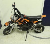 An MX Race Pro 100cc pit bike