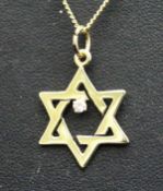 A 14ct gold necklace with Star of David pendant set with a solitaire diamond