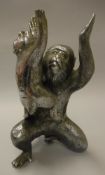 A Japanese silvered bronze figure group of a monkey and young upon her knee bearing three character