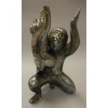 A Japanese silvered bronze figure group of a monkey and young upon her knee bearing three character