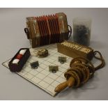 A vintage Viceroy concertina, skipping rope, battleships game,