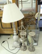 A painted wooden table lamp, together with two cast pricket-style candlesticks,