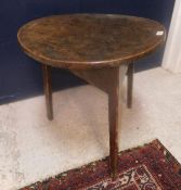 A 19th Century walnut cricket table,