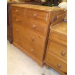 A modern pine chest of two short over three long drawers to bracket feet,