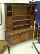 A 19th Century North Country oak and inlaid dresser,