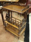 A Victorian burr walnut Canterbury with galleried shelf over three tiers and three section music