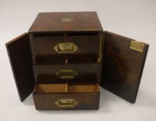 A Victorian burr walnut and brass embellished table top cabinet,