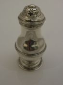 A George V Britannia standard silver pounce pot of typical form (by Charles Stuart Harris & Sons