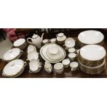 A Richard Ginori dinner service with gilt / black banded edging (56 pieces)