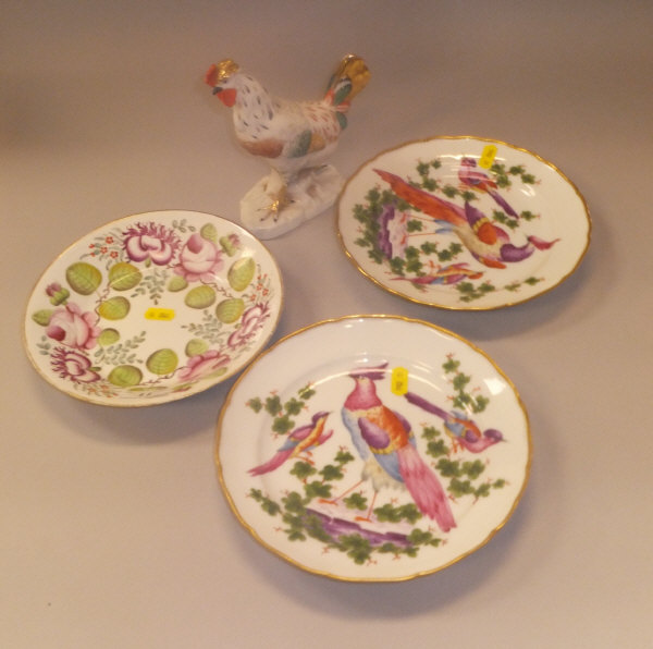 A pair of Sampson porcelain plates decorated with exotic birds, a Sampson figure of a chicken,