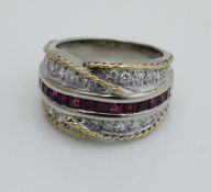 A yellow and white gold (unmarked) dress ring,