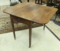 A 19th Century mahogany drop leaf Pembroke table on square tapered legs,