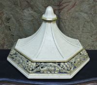 A large cream painted and gilded oak wall bracket in the classical style with grape and vine