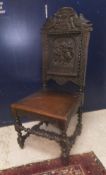 A 19th Century oak hall chair,