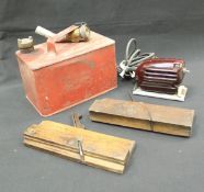 A roll of various spanners and tools, a Valor petrol can, foot pump, jack,