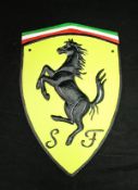 A collection of six painted cast iron signs "Lamborghini", "Ferrari", "Ducati",