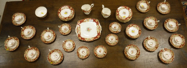 A Paragon "Pompadour" pattern part tea service comprising 18 plates, 17 saucers, 14 teacups,