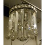 A circa 1900 facet cut glass bag ceiling light with heavy cut glass drops