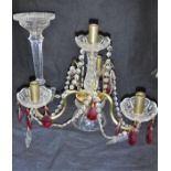 A cut glass and ruby glass four branch épergne and further cut glass candlestick