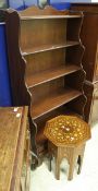 A modern mahogany waterfall bookcase with two drawers, 77cm wide x 152cm high,