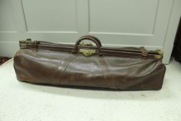 A vintage leather and brass embellished cricket bag of Gladstone style