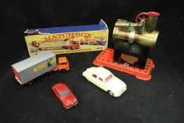 A collection of 1960s diecast vehicles including Corgi Jaguar 2.