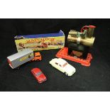 A collection of 1960s diecast vehicles including Corgi Jaguar 2.