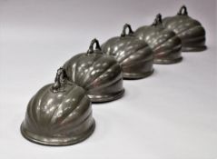 A set of five graduated 19th Century James Dixon of Sheffield pewter meat domes of squash form