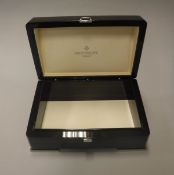 A Patek Philippe table top jewellery / presentation box in cardboard case