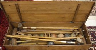 A vintage croquet set with 8 mallets,