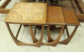 A 1970's G-Plan "Kelso" nest of 3 occasional tables with brown tiled top,