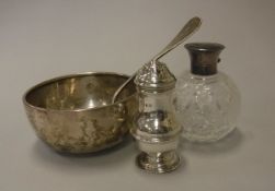 A silver mounted grenade scent bottle (Birmingham 1915), the top with tortoiseshell inset,