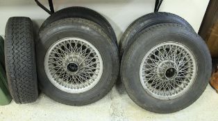 A set of five circa mid 1960s Jaguar E Type wire wheels with Michelin XVS tyres CONDITION