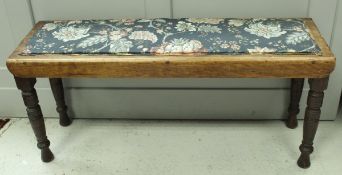 A Victorian campaign bench or duet stool bearing ivorene plaque "Leslie Belcher House Furnishers,