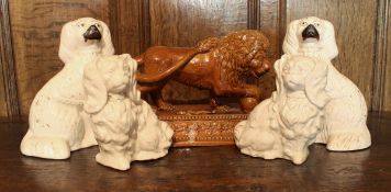 A pair of Staffordshire spaniels, with gilt decoration, approx 25 cm high,