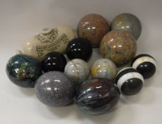 A collection of nine various hardstone balls, the three largest approx 15 cm diameter,