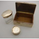 An Edwardian silver cigarette box of plain rectangular form (by William Neal, Chester 1908),