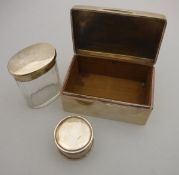 An Edwardian silver cigarette box of plain rectangular form (by William Neal, Chester 1908),