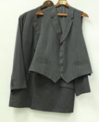 A collection of six various pin-stripe suits one with waistcoat together with a further jacket to