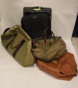 A collection of holdalls,