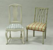 A pair of painted Regency style standard chairs with check upholstered seats on turned and reeded
