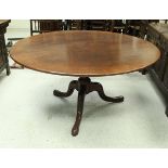 A modern oak breakfast table in the 18th Century manner,