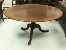 A modern oak breakfast table in the 18th Century manner,